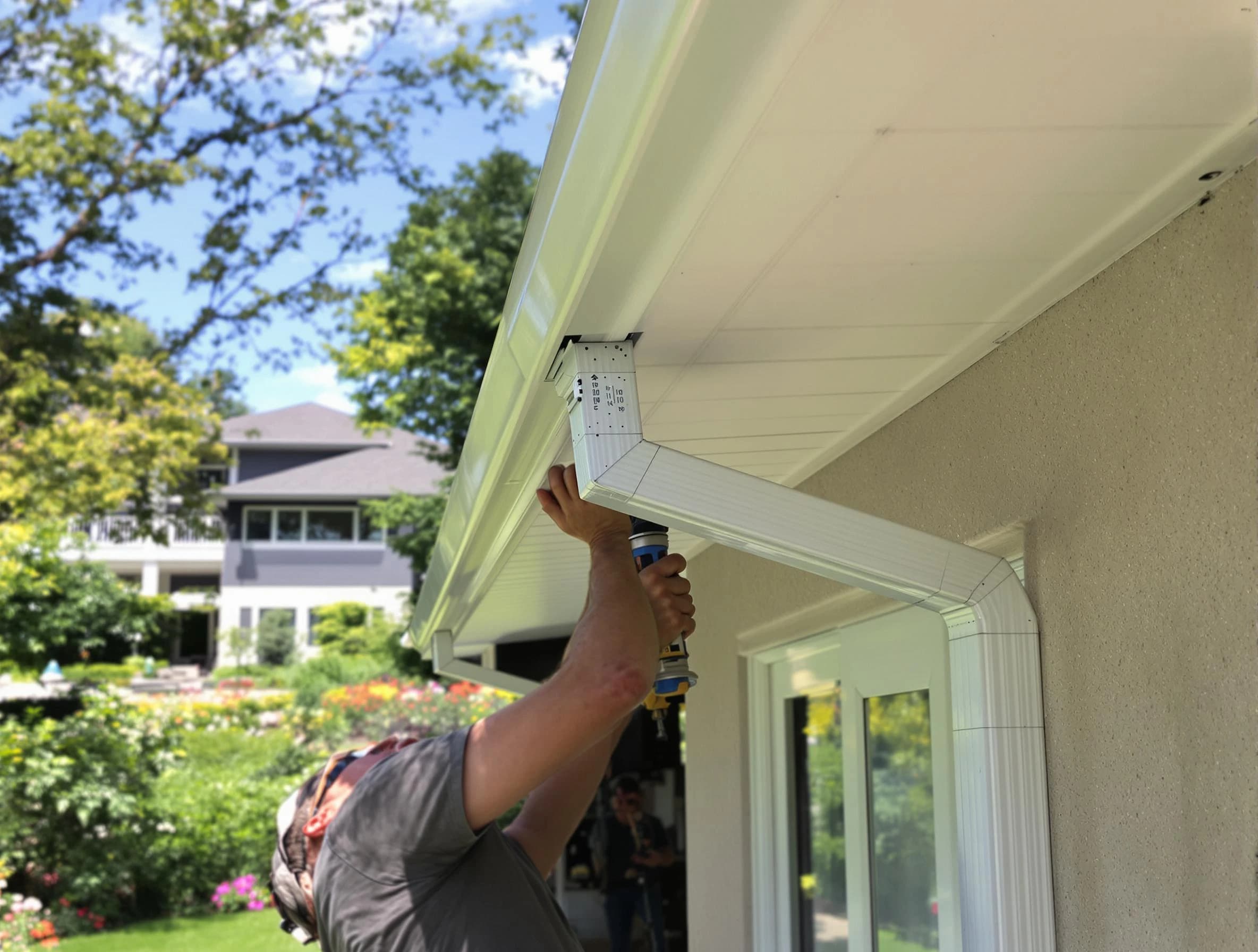 Rocky River Roofing Company technicians performing gutter installation in Rocky River, OH