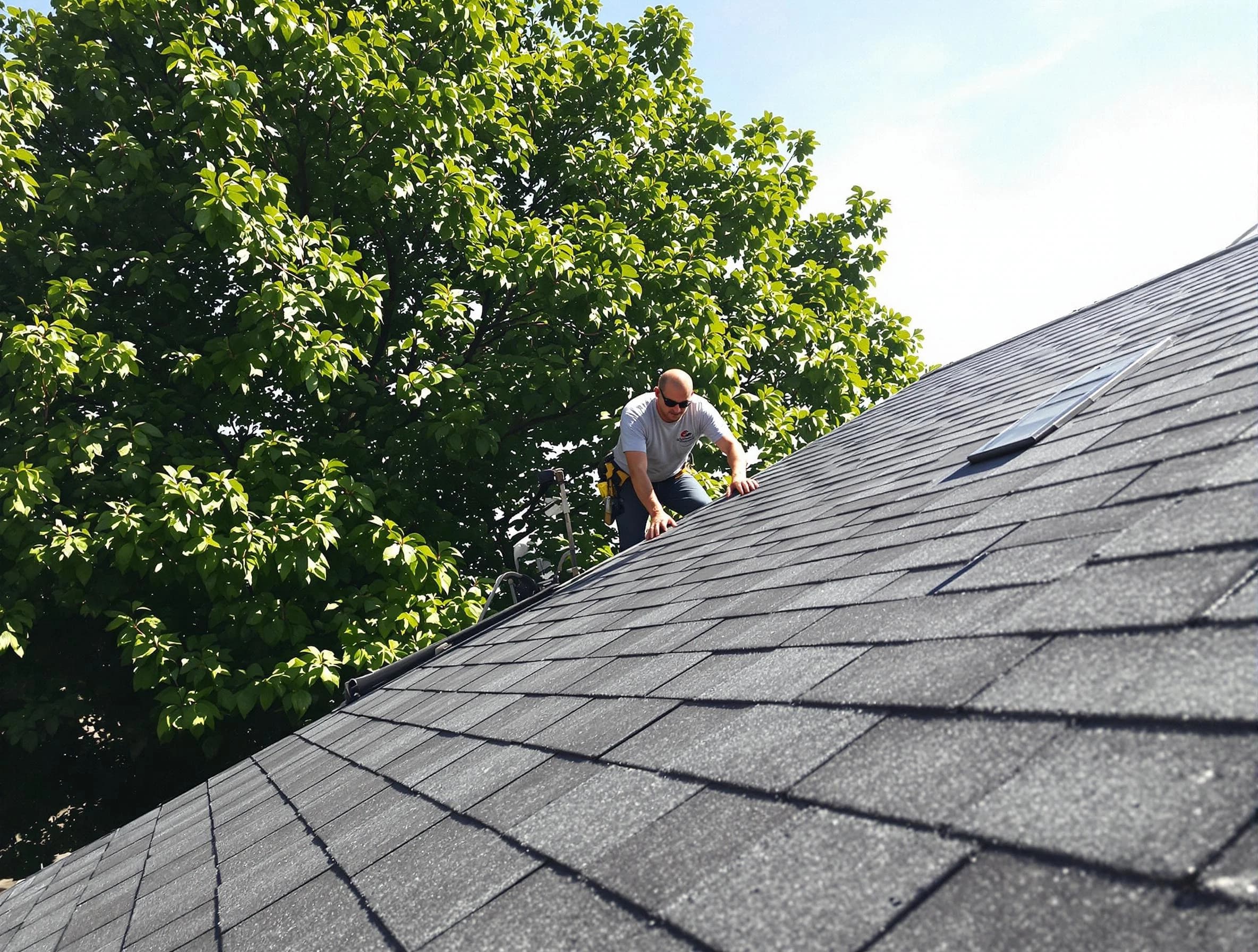 Certified roofers from Rocky River Roofing Company working in Rocky River, OH